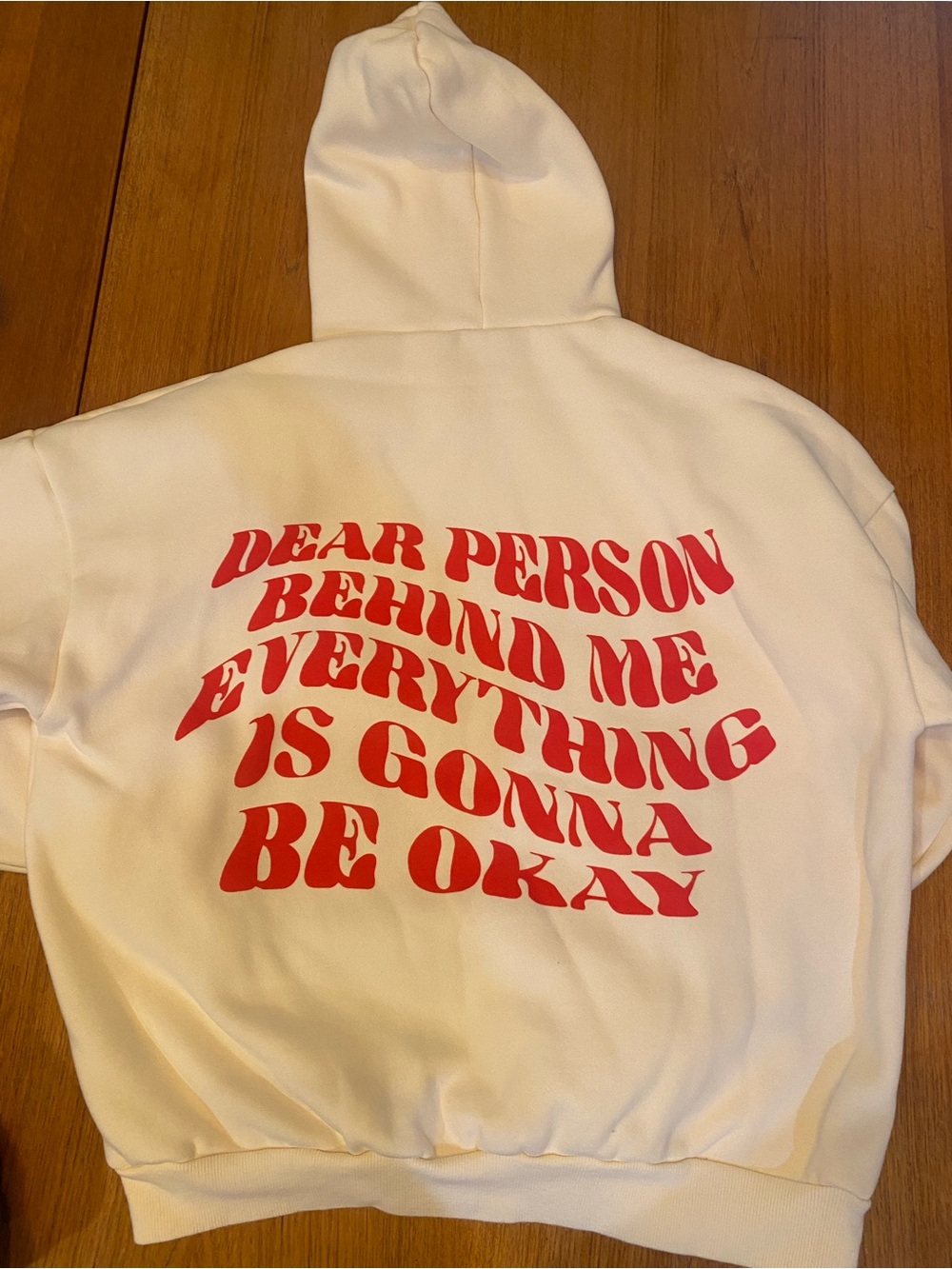 Edikted Cream Hoodie with Pink Woven Brand Tag and Blue Logo